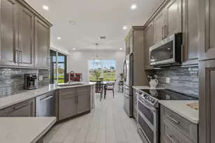 5927 3 Iron Dr, Naples, FL 34110 - Photo 1