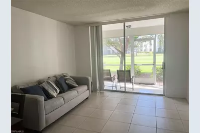 180 Turtle Lake Ct #106, Naples, FL 34105 - Photo 1