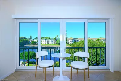 3055 Riviera Dr #306, Naples, FL 34103 - Photo 1