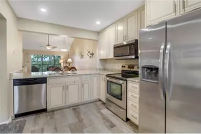 3002 Sandpiper Bay Cir #A305, Naples, FL 34112 - Photo 1