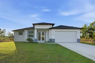 406 Genoa Ave S, Lehigh Acres, FL 33974 - Photo 1