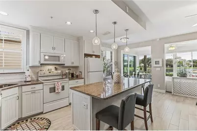 24796 Lakemont Cove Ln #101, Bonita Springs, FL 34134 - Photo 1