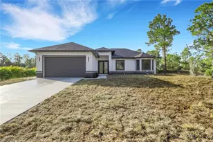 648 Ames St E, Lehigh Acres, FL 33974 - Photo 1