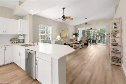 675 Wiggins Lake Dr #201, Naples, FL 34110 - Photo 1