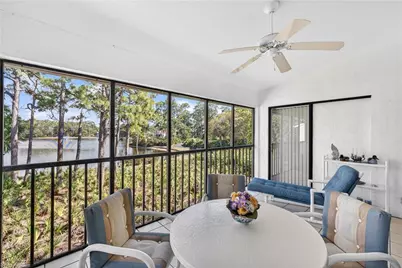 15470 Cedarwood Ln #203, Naples, FL 34110 - Photo 1