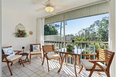 5654 Woodmere Lake Cir #C203, Naples, FL 34112 - Photo 1