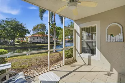 2460 Old Groves Rd #E102, Naples, FL 34109 - Photo 1