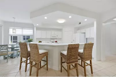 1634 Tarpon Bay Dr S #102, Naples, FL 34119 - Photo 1