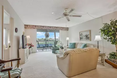 4372 27th Ct SW #202, Naples, FL 34116 - Photo 1