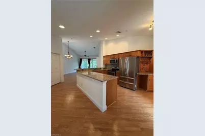 5070 Cedar Springs Dr #201, Naples, FL 34110 - Photo 1