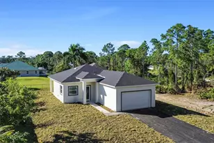 506 Trinity St E, Lehigh Acres, FL 33974 - Photo 1