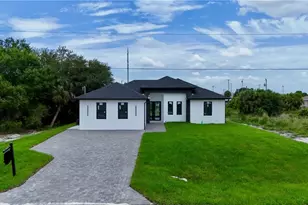 830 Wolverine St E, Lehigh Acres, FL 33974 - Photo 1
