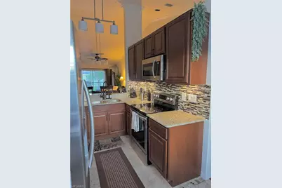 181 Grand Oaks Way #Q203, Naples, FL 34110 - Photo 1