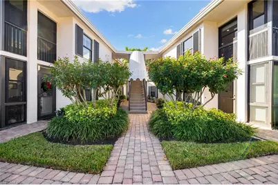 3135 Riviera Dr #B205, Naples, FL 34103 - Photo 1