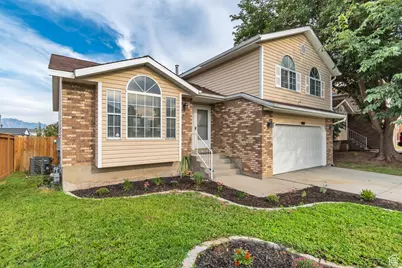 6905 S Sandlily Cir W, West Jordan, UT 84081 - Photo 1