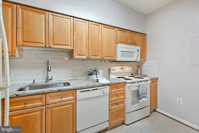 3210 N Leisure World Boulevard #311, Silver Spring, MD 20906 - Photo 13