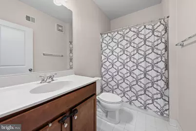 1400 Ribbon Limestone Terrace SE #E-201, Leesburg, VA 20175 - Photo 23