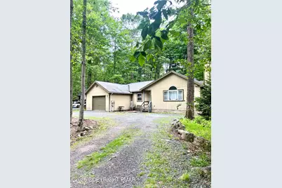  235 Paxinos Drive, Pocono Lake, PA 18347 - Photo 1