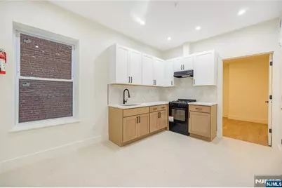 10 School Street 2 #2, Passaic, NJ 07055 - Photo 1