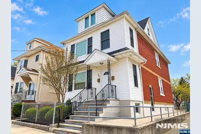 557 Gregory Avenue, Passaic, NJ 07055 - Photo 1