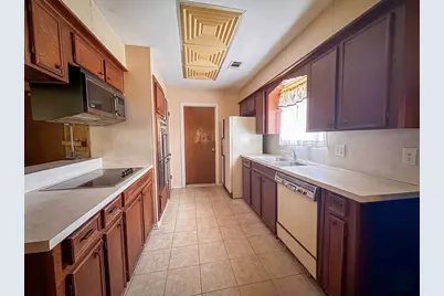 10407 Huntington Wood Drive, Houston, TX 77099 - Photo 9
