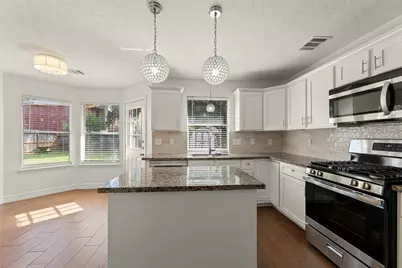 11430 Weathering Oaks Drive, Houston, TX 77066 - Photo 11