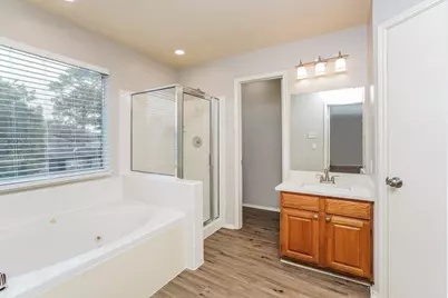 8310 Woodland Willows Drive, Houston, TX 77083 - Photo 11