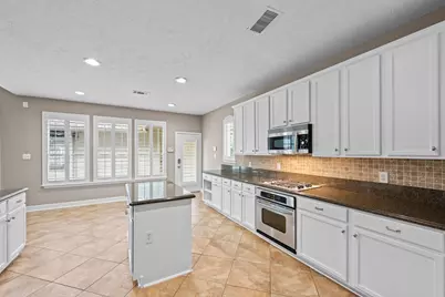 14343 Millstone Estates Lane, Cypress, TX 77429 - Photo 9