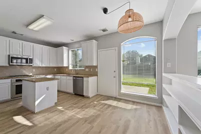 9107 Huckinston Court, Spring, TX 77379 - Photo 9