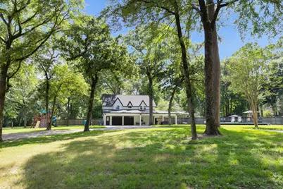 819 Sentinel Oaks, Pinehurst, TX 77362 - Photo 1