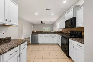 12050 Quartersawn Ln, Pinehurst, TX 77362 - Photo 7