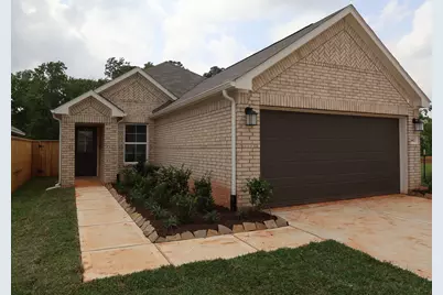 682 Falling Cave Drive, Willis, TX 77378 - Photo 1