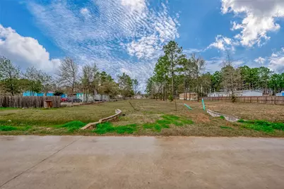 1528 County Road 5017, Cleveland, TX 77327 - Photo 1