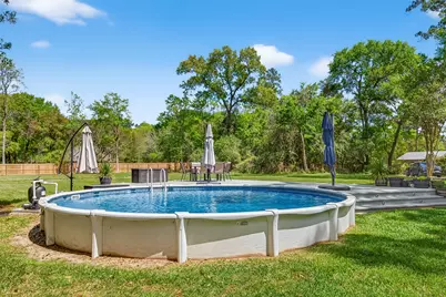 819 Sentinel Oaks, Pinehurst, TX 77362 - Photo 33