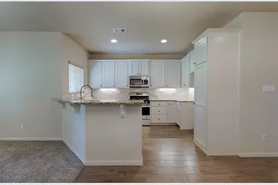 12960 Orion Court E, Willis, TX 77318 - Photo 7