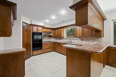 3406 Wildwood Ridge Court, Houston, TX 77339 - Photo 13