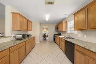 7727 Heron Lakes Drive, Houston, TX 77064 - Photo 13