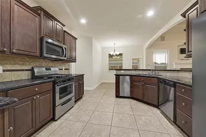 14007 Tobago Court, Mont Belvieu, TX 77523 - Photo 9