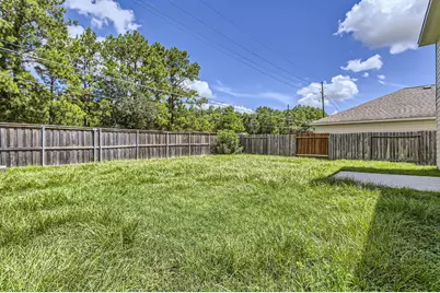 11746 Elizabeth Court, Pinehurst, TX 77362 - Photo 19