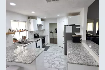 8827 Woodleigh Drive, Houston, TX 77083 - Photo 37