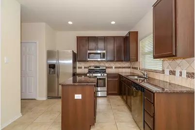 14935 Vinegrove Falls Court, Cypress, TX 77433 - Photo 11