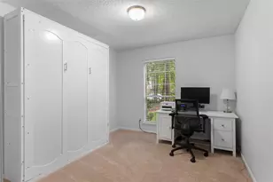 99 S Village Knoll Cir, The Woodlands, TX 77381 - Photo 11