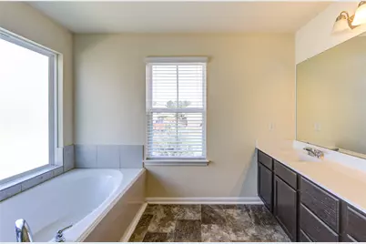 10907 Woodland Leaf Lane, Tomball, TX 77375 - Photo 25