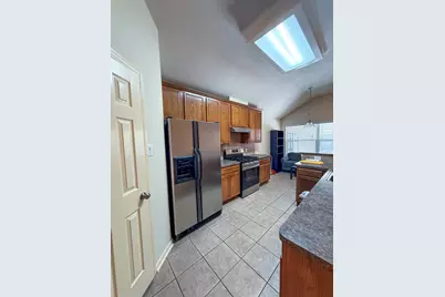 8027 Daylilly Creek Drive, Houston, TX 77083 - Photo 7