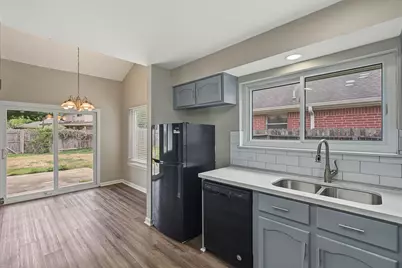 8406 Woodland Willows Drive, Houston, TX 77083 - Photo 11