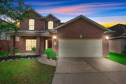 10039 Noisy Waters Drive, Houston, TX 77095 - Photo 1