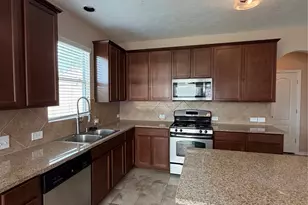 7034 Sun Creek Dr, Hitchcock, TX 77563 - Photo 9