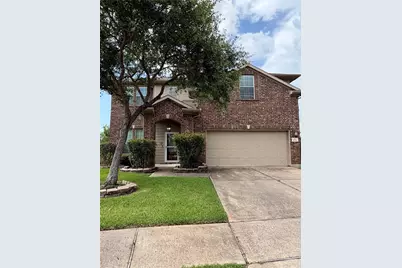 7034 Sun Creek Drive, Hitchcock, TX 77563 - Photo 1