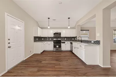 9418 Belleclaire Lane, Houston, TX 77044 - Photo 11