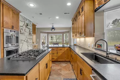 7000 Woodland Lakes Dr, Willis, TX 77378 - Photo 33